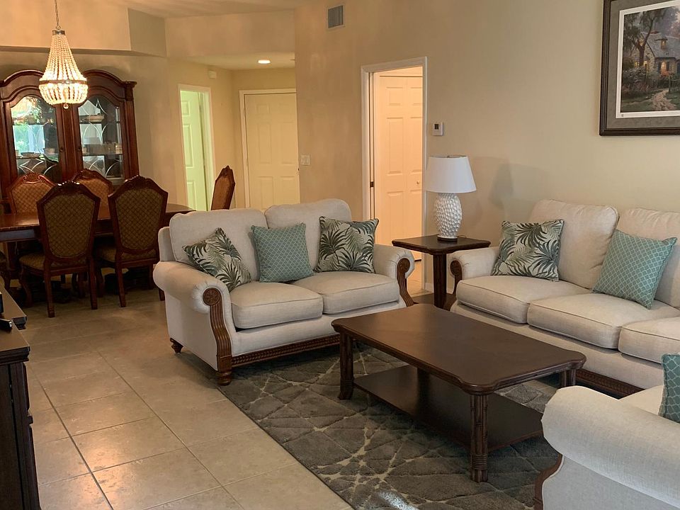 Beautifully furnished living room and dining areas