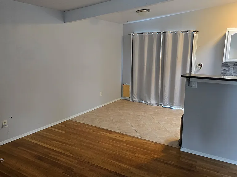 Living room entry into kitchen/ dining nook