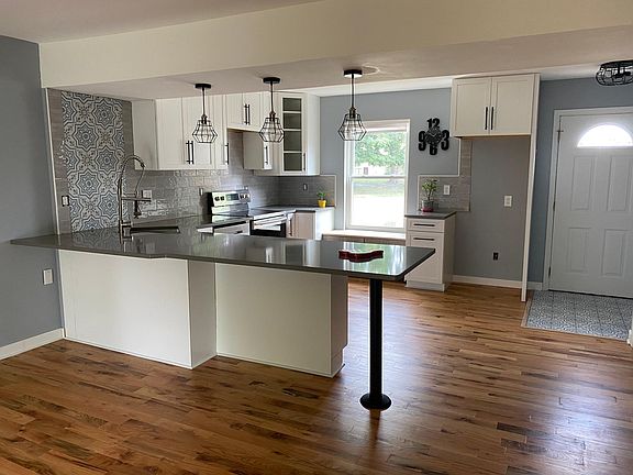 Kitchen. The Fridge and microwave are already installed. The picture was taken before
