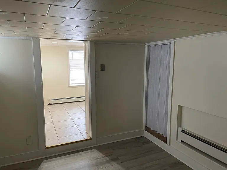 BR from Bath and entry to Kitchen