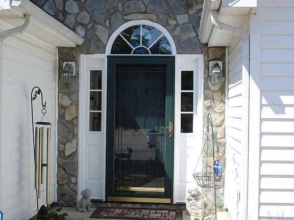 Stone surrounds front entrance