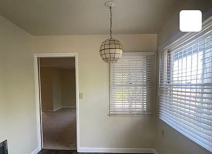 Breakfast nook from kitchen looking into living room