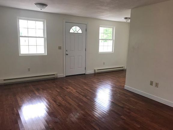 Alternate view of living area, facing front door