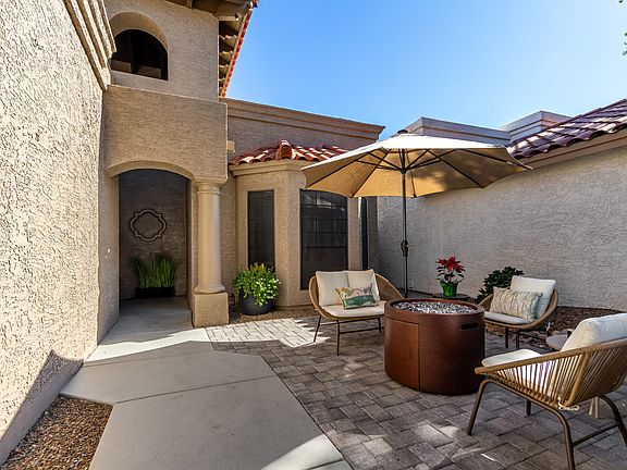 Front courtyard with new brick pavers, new exterior paint, new lighting, and new landscaping!