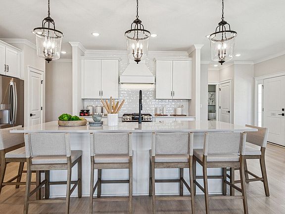 Kitchen with pendant lighting over island