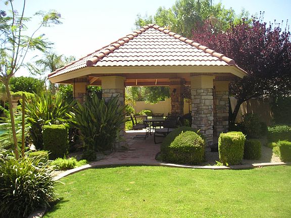 Huge outdoor dining #2 area and Gazebo.  Wired for electric/cable/DirectTV