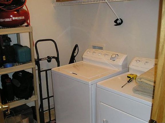 In unit washer & dryer with additional storage