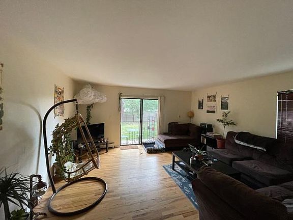 Living room with door to back yard