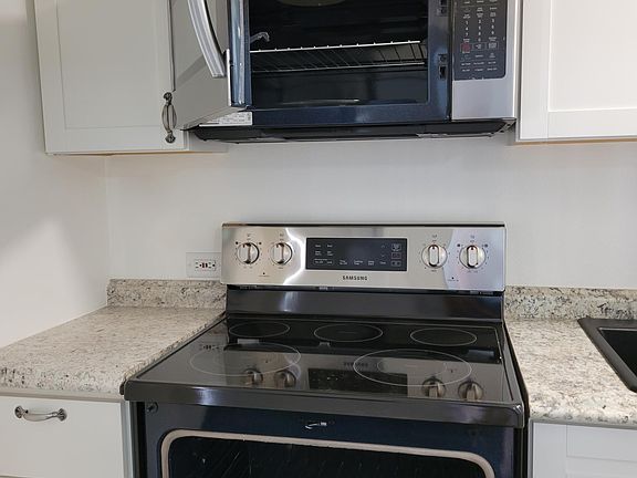 Kitchen microwave oven and stove
