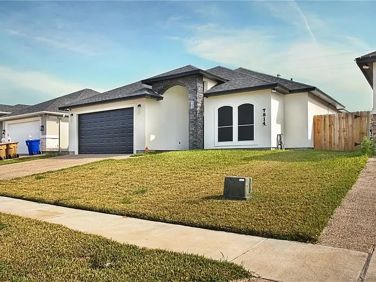 Additional exterior view showcasing the home and surrounding property.