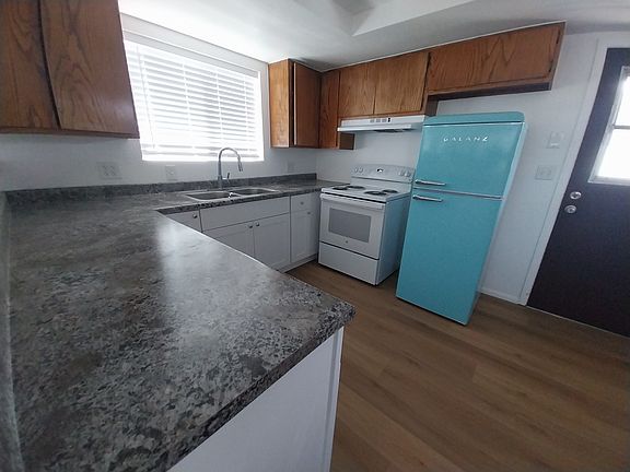 New countertops, stove/oven and retro fridge.