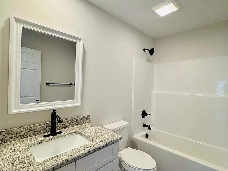 205 Simpson St — Photo 12