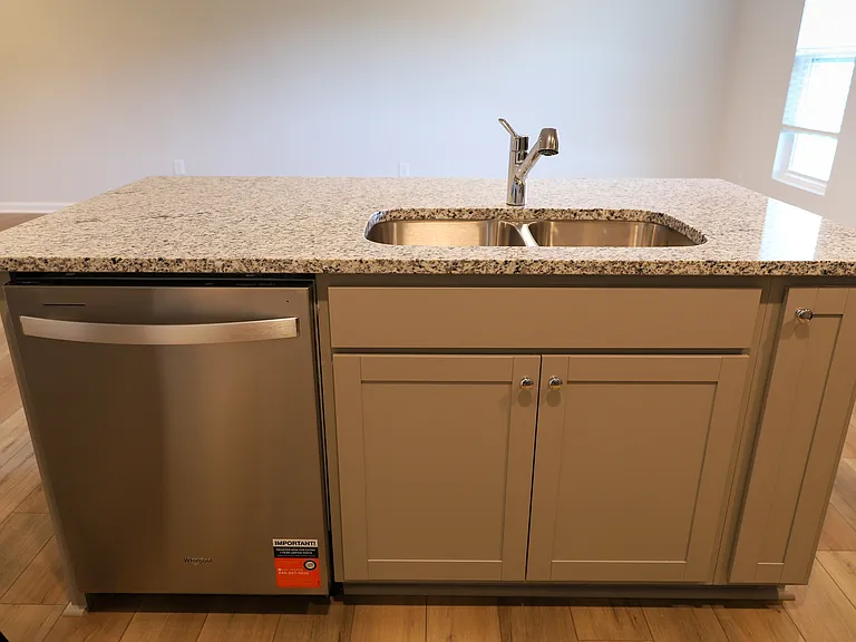 Dishwasher in the Island with double bowl sink and garbage disposal