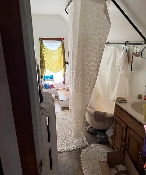 Large bath with historic claw foot tub/shower