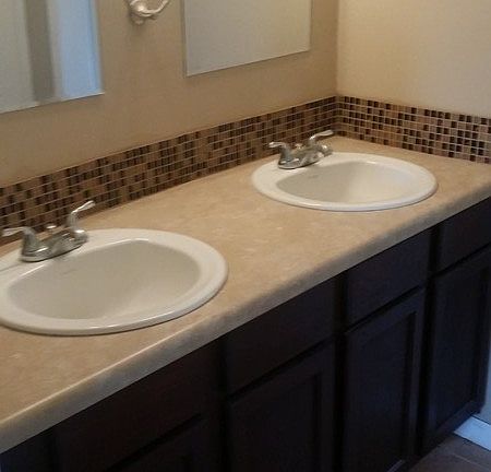 Bathroom
						:
						double vanity, mosaic glass tile back splash