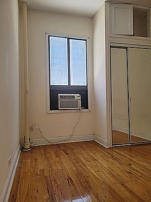 4th image of 300 W 49th St APT 208