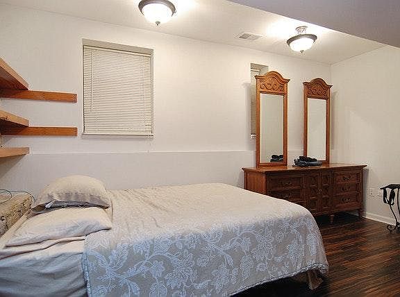 Bedroom with exposed brick