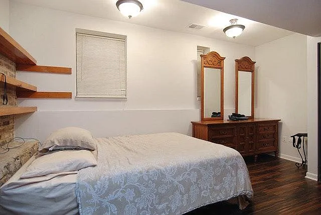 Bedroom with exposed brick