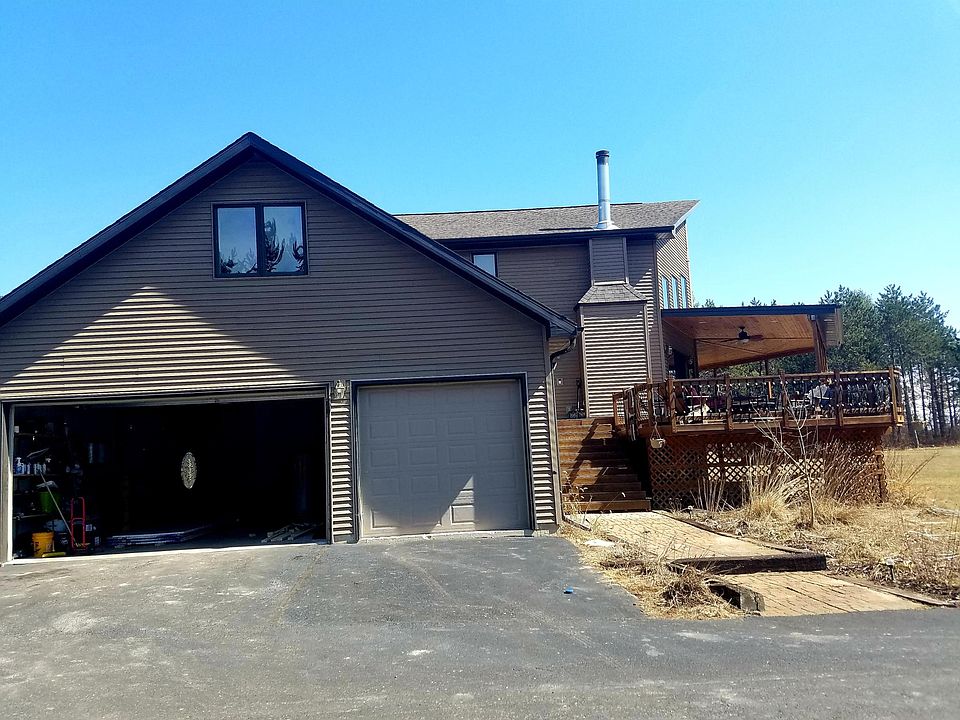 Attached Garage and side view of house