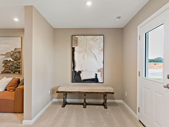 Entrance York II at King s Crossing, Townhomes. Charles Town, WV. Foyer with modern finishes and sty