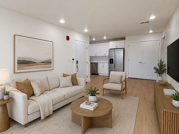 Virtually staged to help show possible furniture layout and use of space.