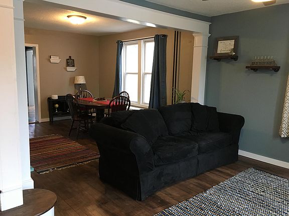 Beautiful original wood floors and archways