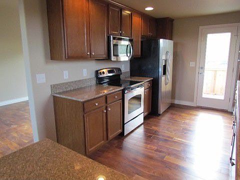 Wood Floors, Granite Counters
