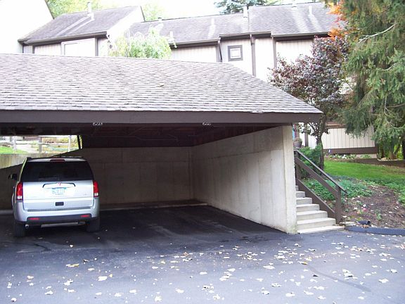 One carport for renter; guests can park in the lot