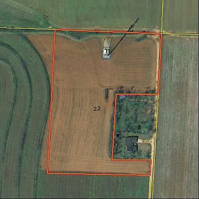 private lot surrounded by farmland
