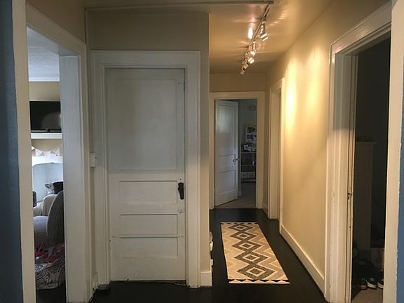 View from kitchen ..Hall to bedrooms and bath from kitchen