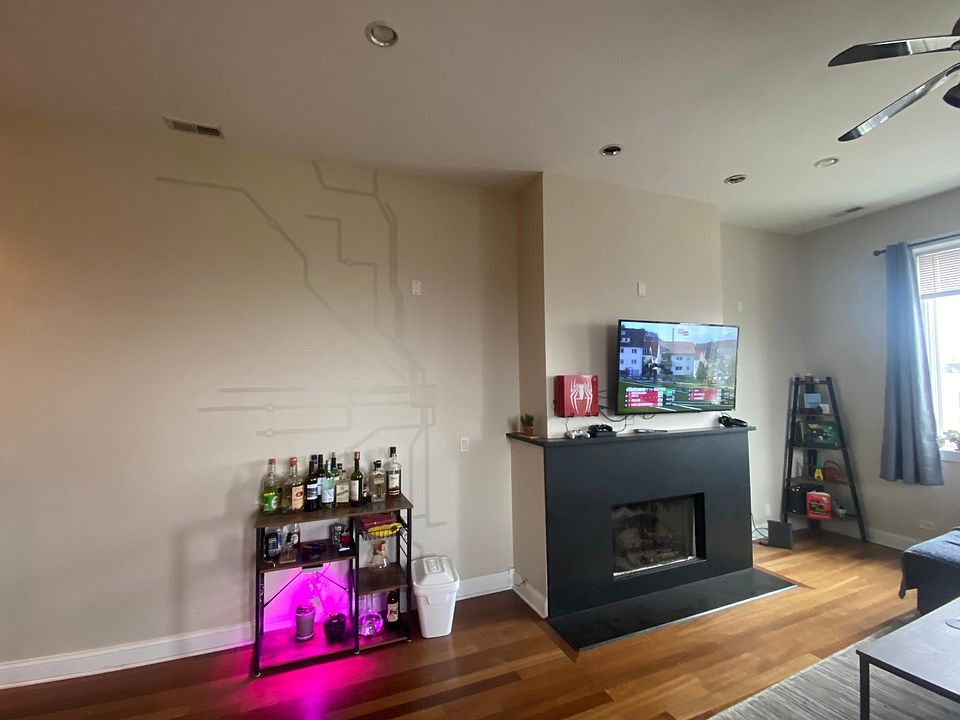 Recently painted with unique Chicago artwork on he wall.