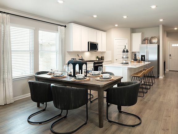 This floorplan features modern open-concept living and dining spaces.