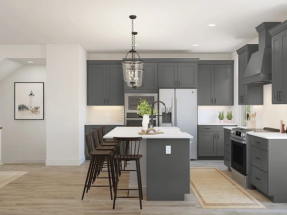 Kitchen with island and pendant lighting
