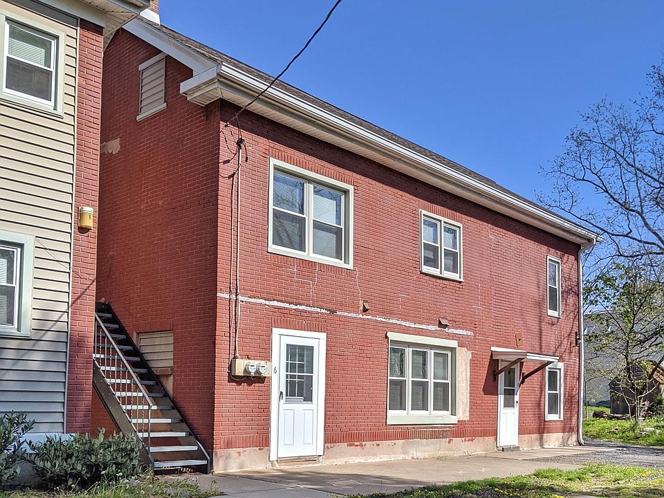 Private entrance to this apartment is located on the side of the building.