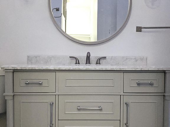 Never Used New Renovated Master Bathroom. Private attached bathroom renovated with real white carrara marble countertops and mosaic tile shower.