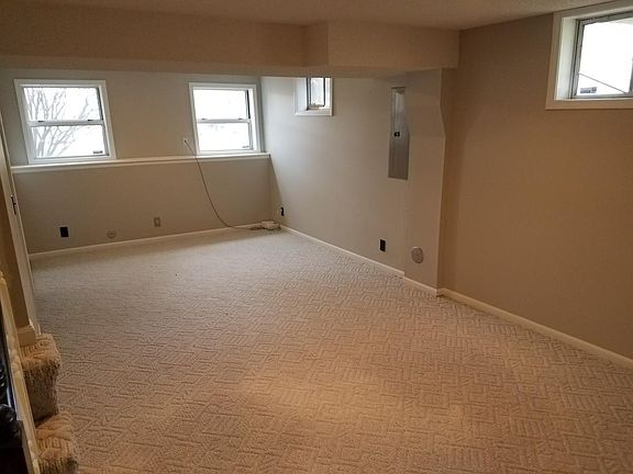 Finished basement with storage area