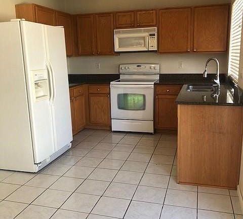 5th image of 18663 E 41st Ave