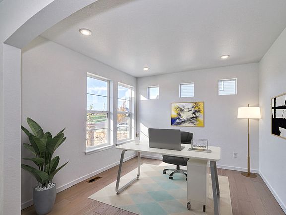The den and flex space can be utilized as a home office, craft space, and more!