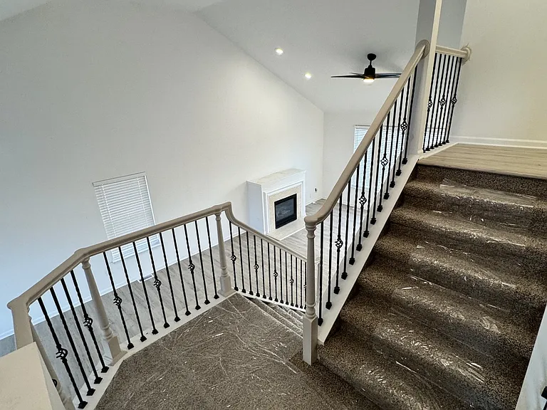 view from mid level Primary suite and loft area