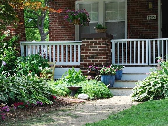 Enchanting Front Porch waitng for Your Swing . .