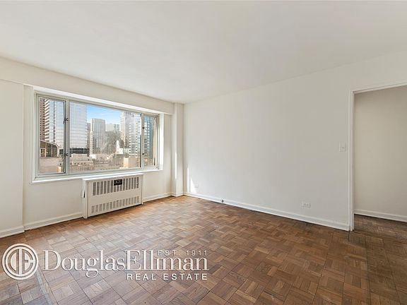 3rd image of 166 E 63rd St Penthouse A
