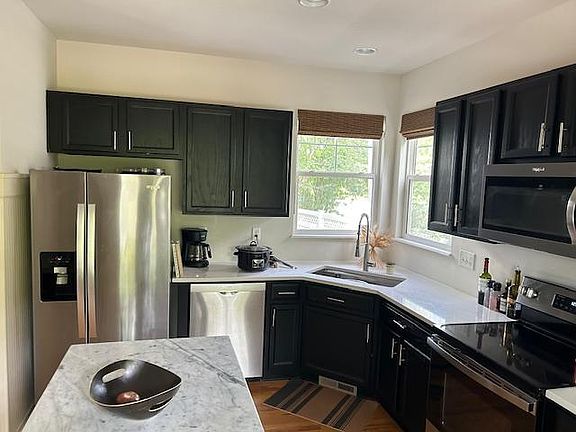Newly remodeled kitchen with quartz counters