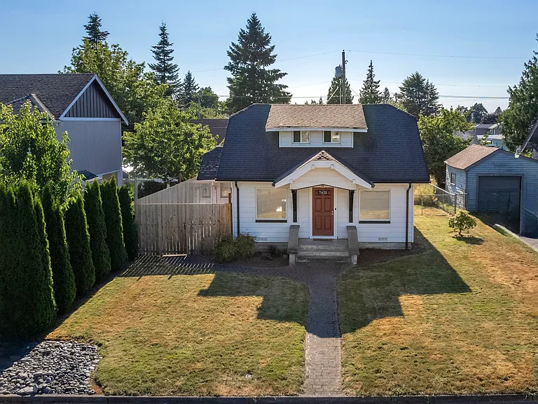 Updated home w/ covered front porch, detached garage and fully fenced yard. Gated back yard for additional parking if needed. Repainting home and garage in spring. New backyard photos coming soon.