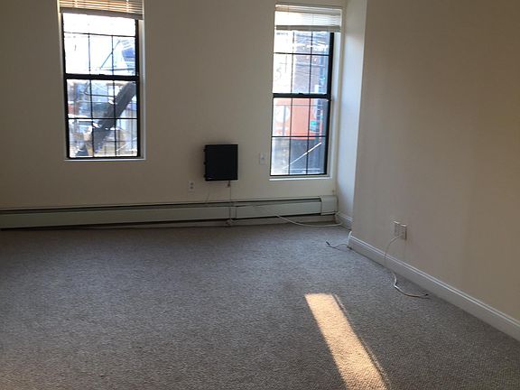 Living room with view of Manhattan skyscrapers