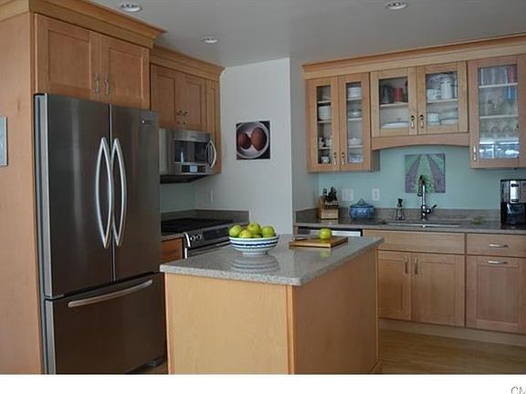 Kitchen with movable center island.