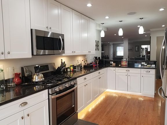 Kitchen View showing under-cabinet and toe kick accent lighting