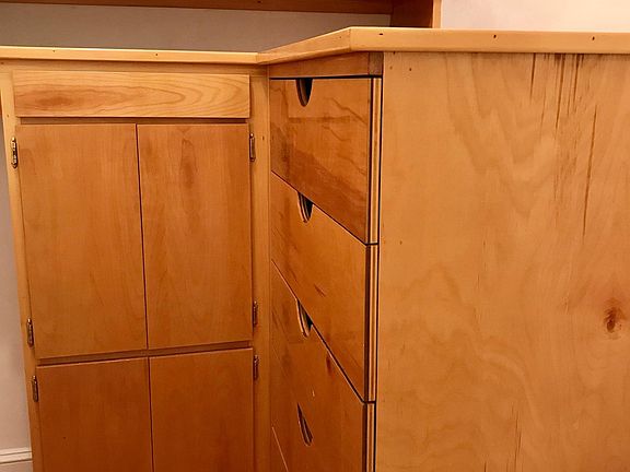 Large walk-in with built in drawers. Two separate closets as well