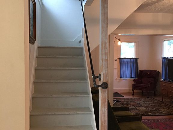 Stairs to bedrooms and power room looking up