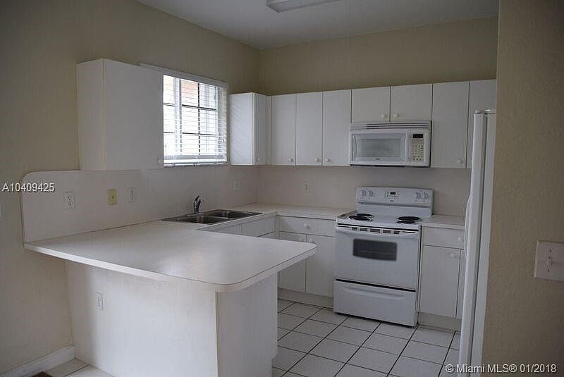 1st image of 372 NE 26th Pl Unit 202