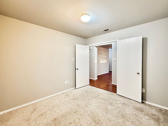 Flex room with French doors - Could be used as Study/ Office, Gym, Game room or as Bedroom #4